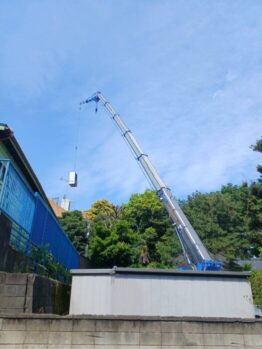 空調室外機揚重及び玉掛け合図合判作業
